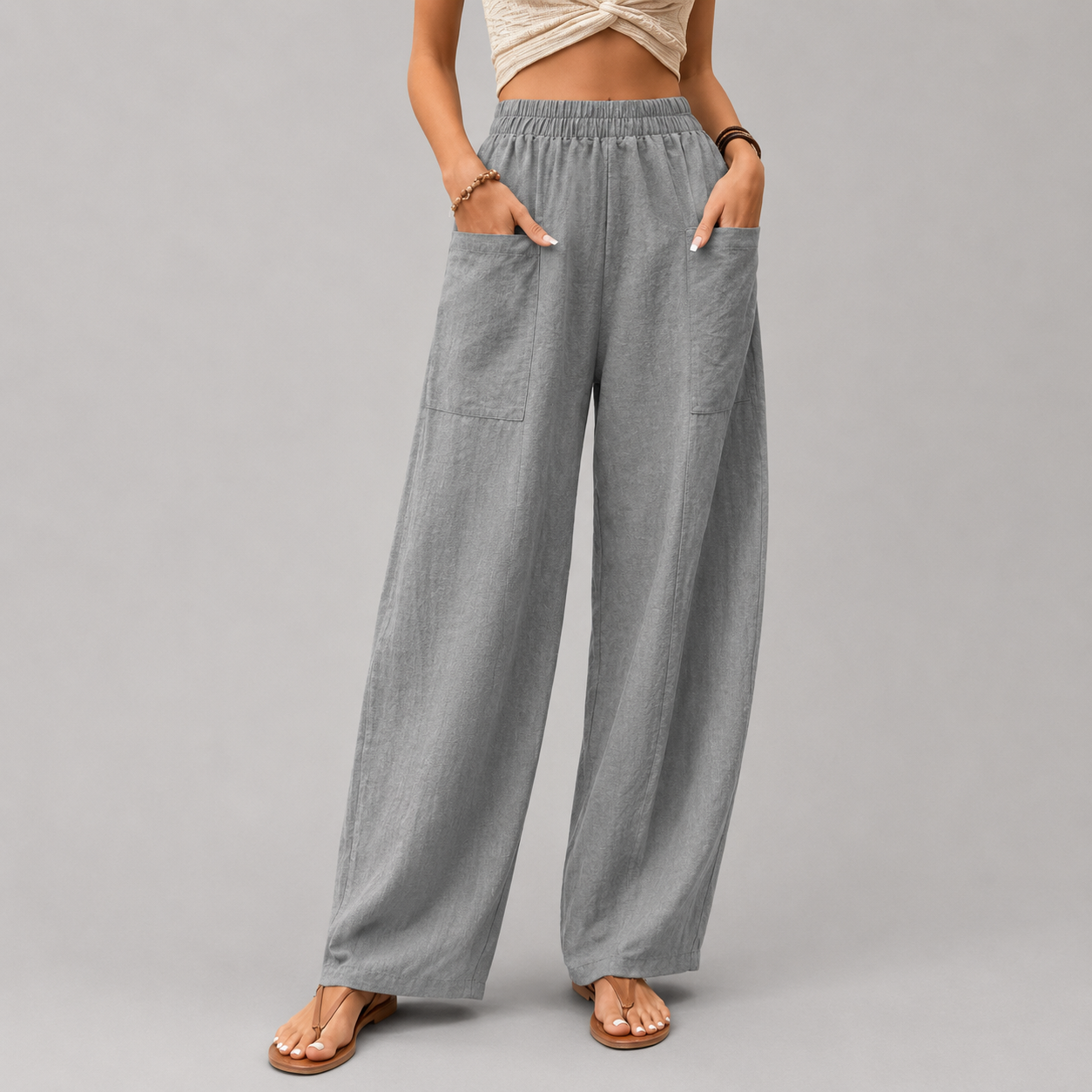 Vanna - Pantaloni fluidi a gamba larga con tasche a patta e vita elastica
